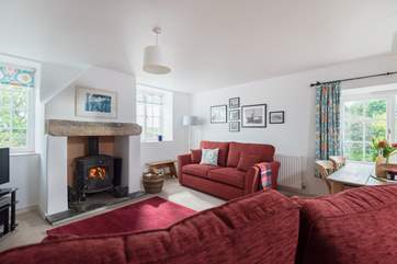 Two comfy sofas around the fireplace...the perfect place to curl up with a good book.
