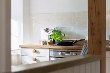 This stylish kitchen is well-equipped and has everything you need to make a meal or a cuppa.