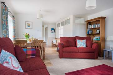 This open plan living-room is warm and welcoming.