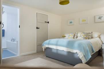 The double bedroom is at the opposite end of the cottage and has a 5ft double bed.