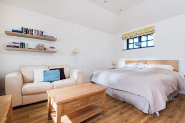 The open plan living-room with 6ft super-king bed which can also be made up as two 3ft singles.