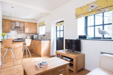 Looking across to the kitchen area from the sofa.