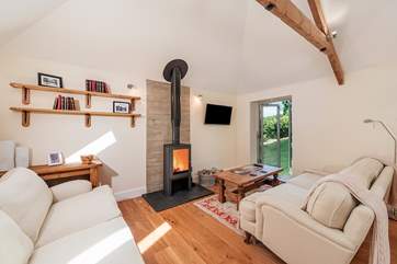 What an attractive room this is. Perfect for snuggling up in after a day of fun and adventure.