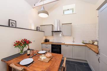 Open plan kitchen and dining area makes serving up a feast for 2 a real pleasure.