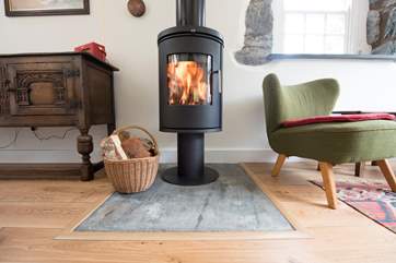 Cosy and warm, relax in front of the fire.