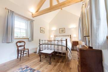 The luxurious en suite bedroom complete with a pocket sprung bed.