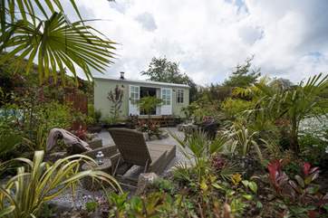 The Shepherd's Hut at Georgia Bridge sitting in its tropical oasis!