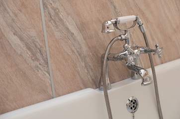 The bath has a shower attachment too.