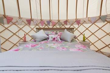 The lovely king-size bed.