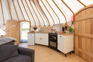 There is even a kitchen area, complete with cooker and fridge!