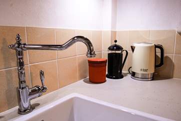 A Belfast sink and Victorian-style tap are in keeping with the age of the cottage.