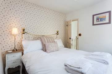 The pretty master bedroom.