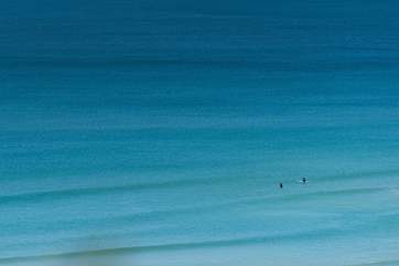 Watch the surfers from the balcony terrace if you prefer to stay dry, or why not join them in the clear blue waters.