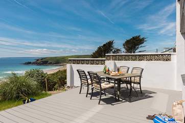 The large deck area is accessed from both the master bedroom and the study, there is also a path at the end of the garden that gets you to the beach without having to go back up to the lane.