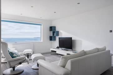 Two of the most comfortable chairs with individual foot rests and a large sofa mean that you can sit together with your feet up for maximum relaxation after a busy day out.