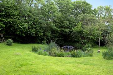 In the grounds below the Studio you can sit by this lovely pond and really take in the birdlife that loves it here too.