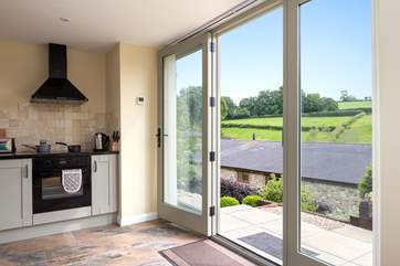 The kitchen shares the same wonderful valley views. Purtington Barn Cottage is below the Studio and so you will feel totally independent and private.