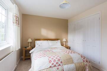 Bedroom 2 is also at the front of the house and is furnished with a double bed.