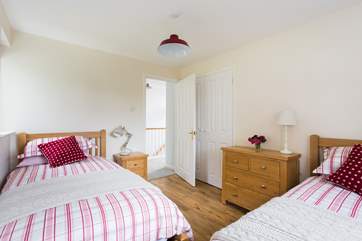 The twin bedroom is next to the family shower-room.