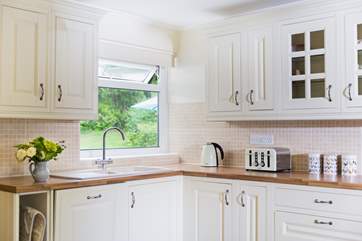 You have a great view of the pretty garden from the kitchen.