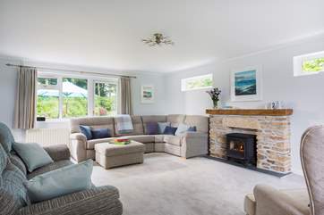 The large sitting-room with room to relax together around the Smart TV complete with Sky package for your viewing pleasure.