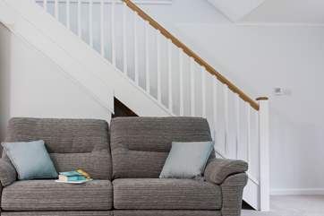 The stairs up to the bedrooms and bath/shower rooms.
