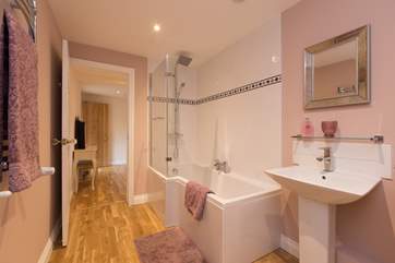Here is the en suite bathroom with bath, shower - and again two shower heads - a wonderful drenching rainfall and a standard head too.
