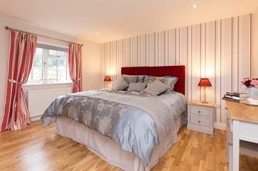This bedroom is between the other two. The zip and link beds are set up here as a super-king size 6 foot bed but can be set up as twins if you wish.