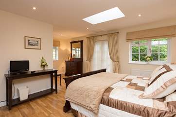 There are three beautifully styled and spacious bedrooms, all are en-suite. This is a 6 foot super-king sized bed - totally luxurious.