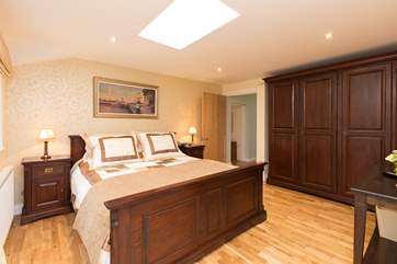 This bedroom has more than enough storage space.