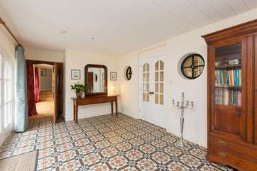 This beautiful tiled entrance hall sets the scene for a very comfortable stay at The Coach House Stables. A coat stand and boot rack is provided.