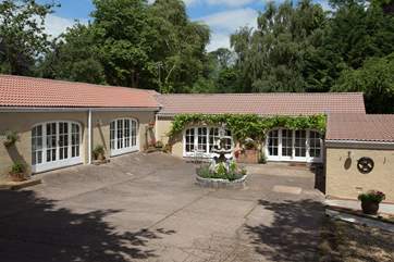 The accommodation is spread over both wings of this pretty stable conversion. The main entrance is the doorway to the right.