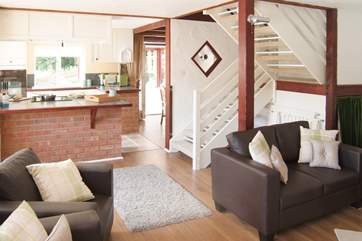 Open plan living on the ground floor and stairs up to the two bedrooms and bathroom.