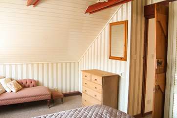 The master bedroom is a lovely place to relax.