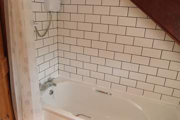The recently fitted family bathroom sits between the two bedrooms on the first floor.