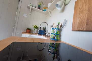 A two-ring induction hob and hot water to your kitchen sink in the middle of the countryside!
