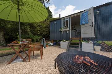 The fire-pit barbecue can cook up a feast!