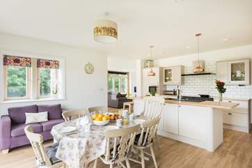 The open plan design brings everyone together but also gives space if you want a quiet spot to sit on a sofa with a good book.