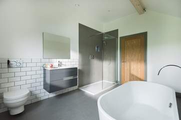 Choose from a relaxing bath in the huge tub or a shower in the large cubicle.