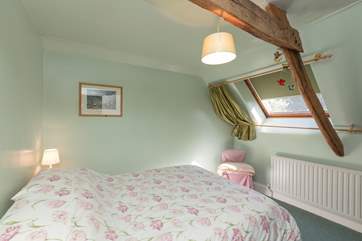 The second bedroom is on the first floor, another comfortable double.
