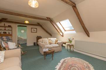 Another view of the living room which has plenty of light and is very friendly and cosy.