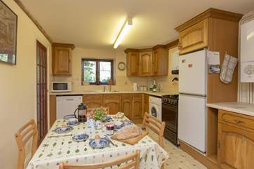 There is a very good sized kitchen/dining room - that is if you are not tempted to eat outside whilst taking in the lovely view.
