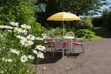 The gardens for you to enjoy are spread out beyond the hard standing area.
