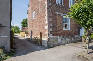 The entrance to Orchard View is through the gate and at the side of the house, parking is on the quiet High Street.