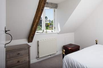 Bedroom 3 looks out to the orchard and countryside beyond.