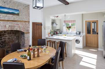 The open plan kitchen/dining/living room is perfect for sociable holiday gatherings.