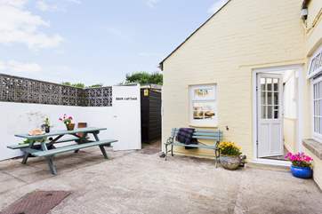 The fully enclosed courtyard is perfect if you bring your four-legged friend with you on holiday.