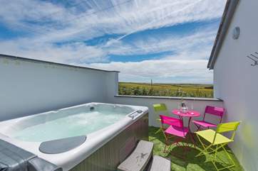 Relax in the hot tub whilst taking in the spectacular views.