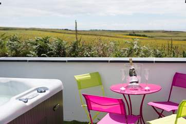 The private terrace houses a hot tub.