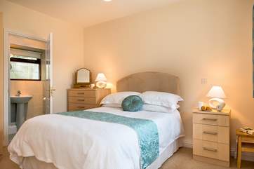 Bedroom 1 is beautifully furnished and has lovely crisp white linen.